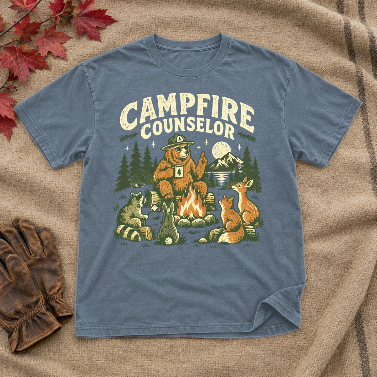 Campfire Counselor Graphic Tee on Heather Indigo Everyday Soft Tee