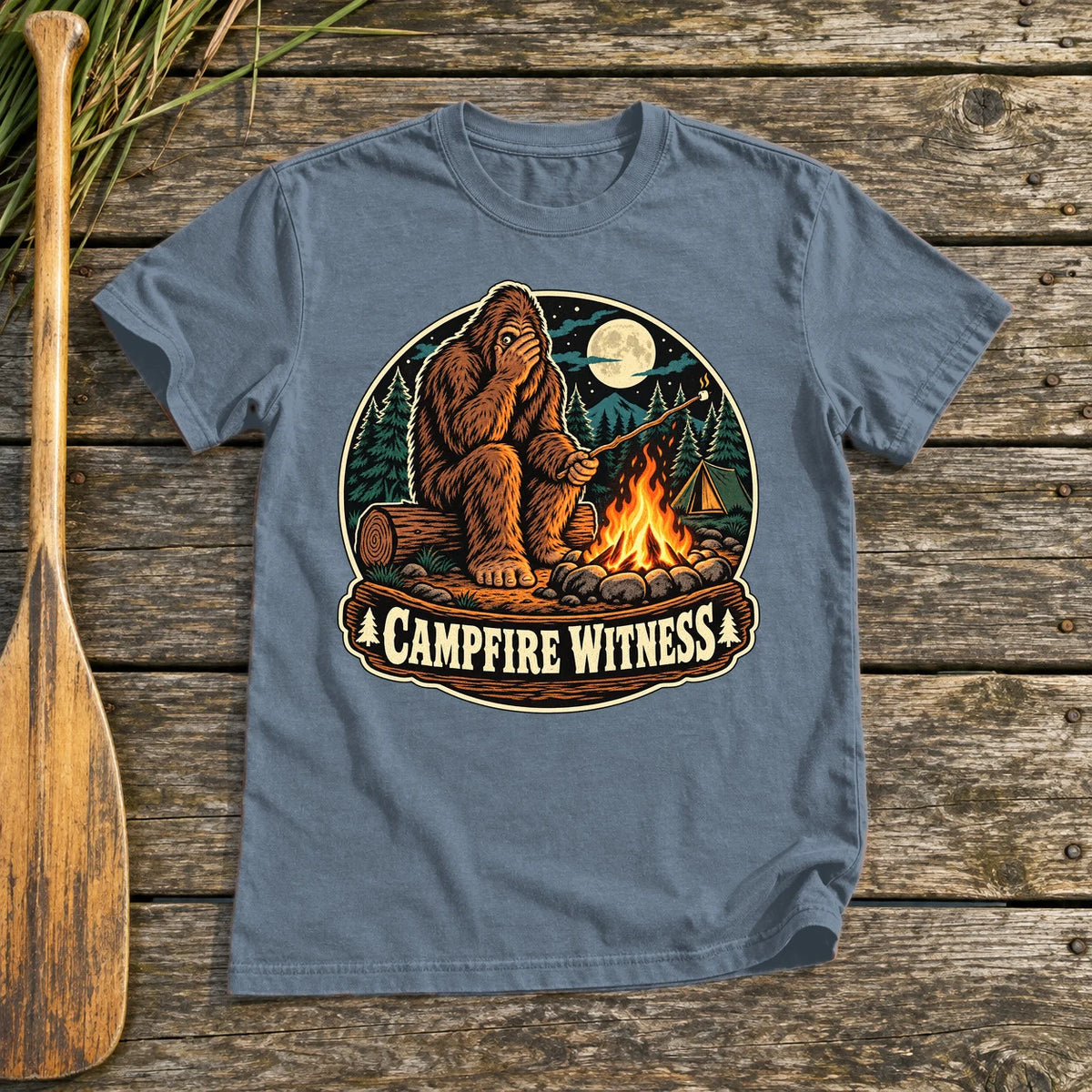 Campfire Witness Bigfoot Graphic Tee on Heather Indigo Everyday Soft Tee
