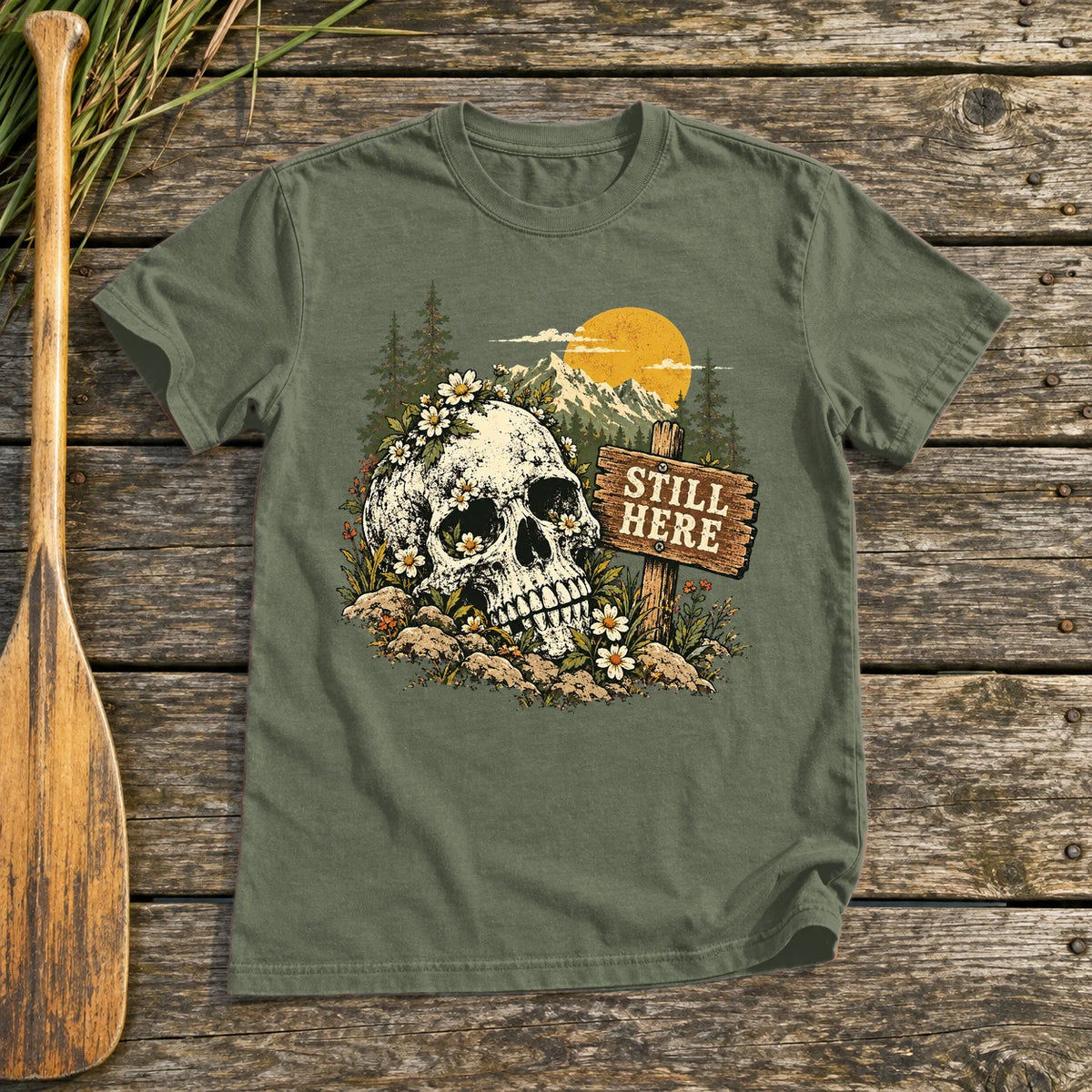 Still Here Mountain Skull Graphic Tee on Military Green Everyday Soft Tee