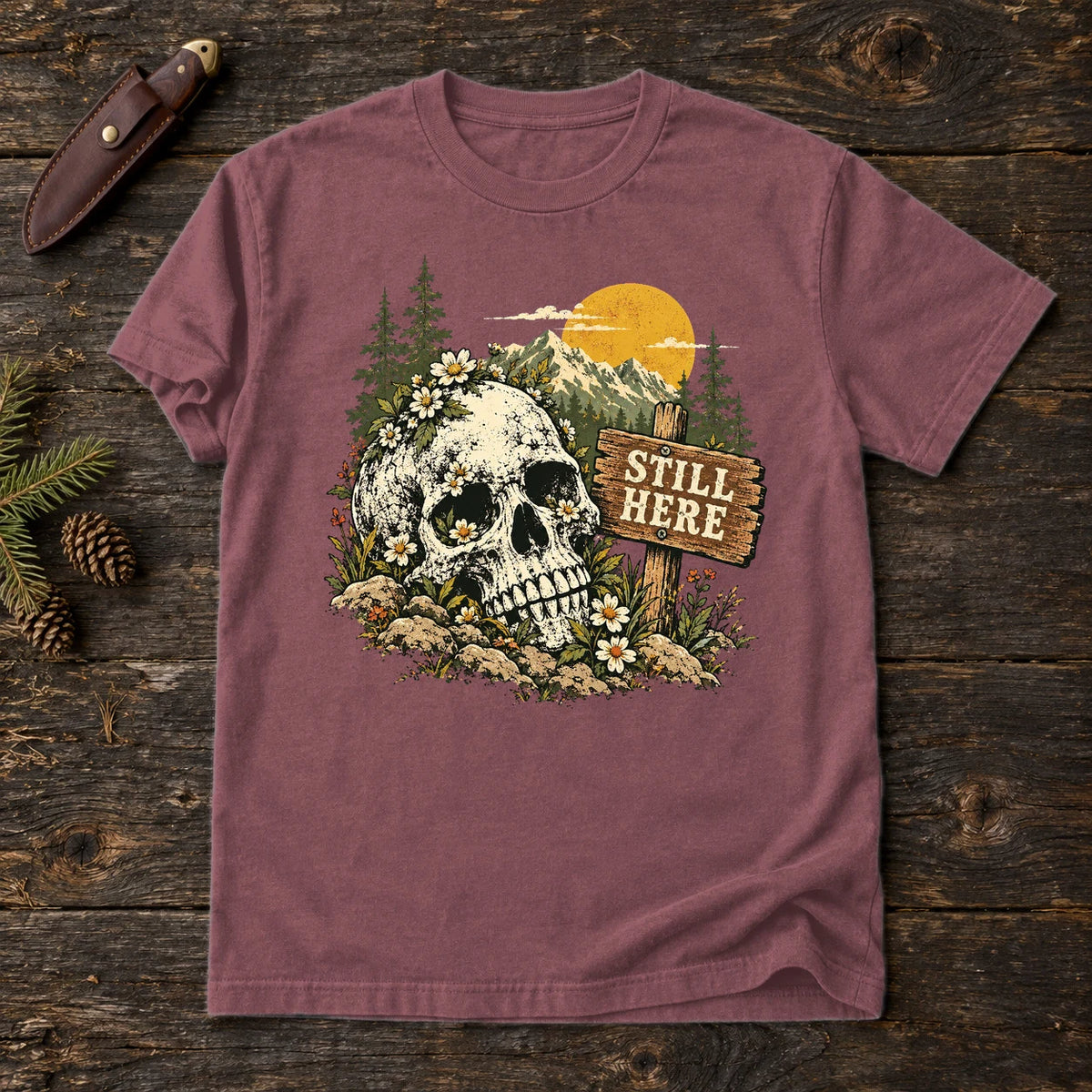 Still Here Mountain Skull Graphic Tee on Brick Premium Tee