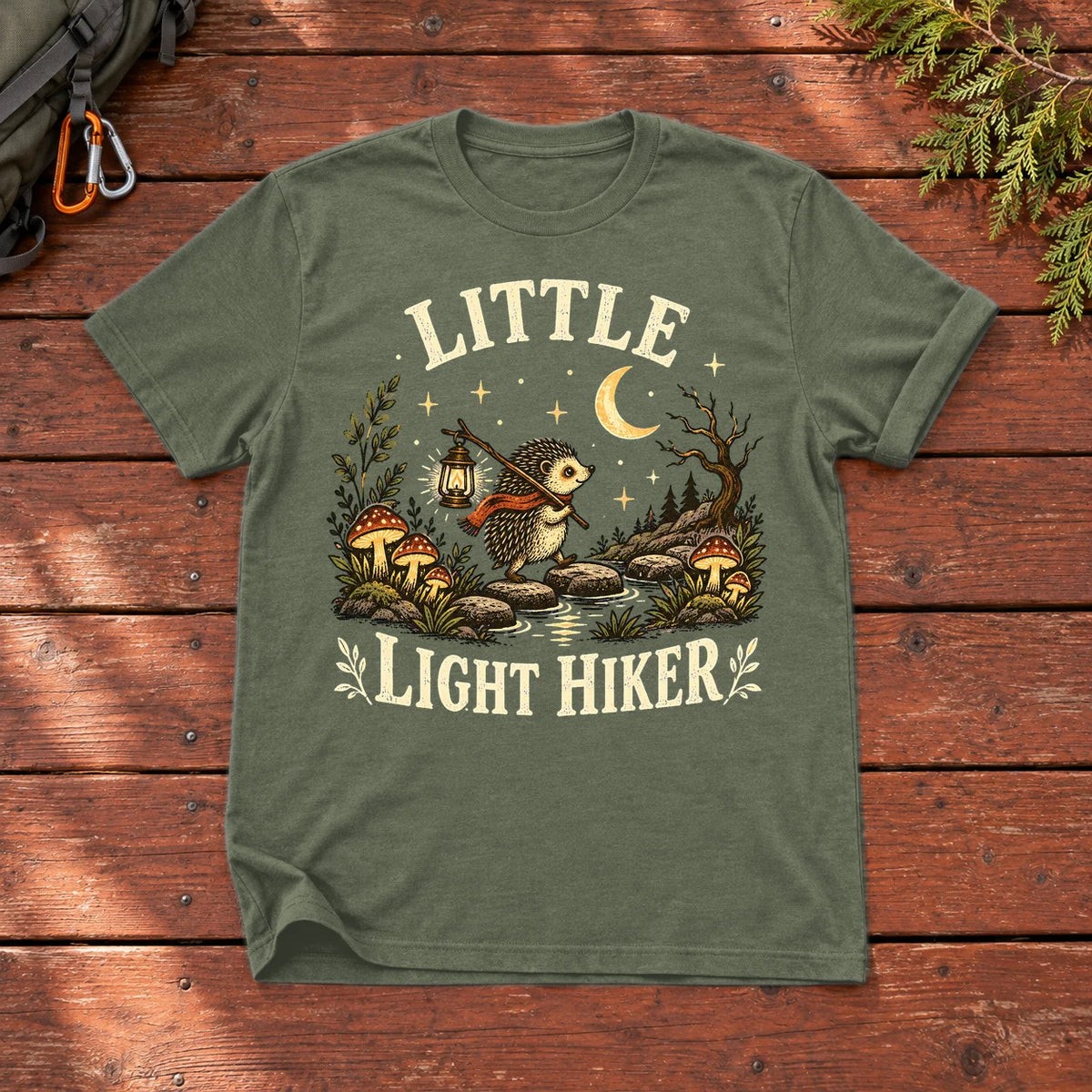 Little Light Hiker Hedgehog Graphic Tee on Military Green Everyday Soft Tee
