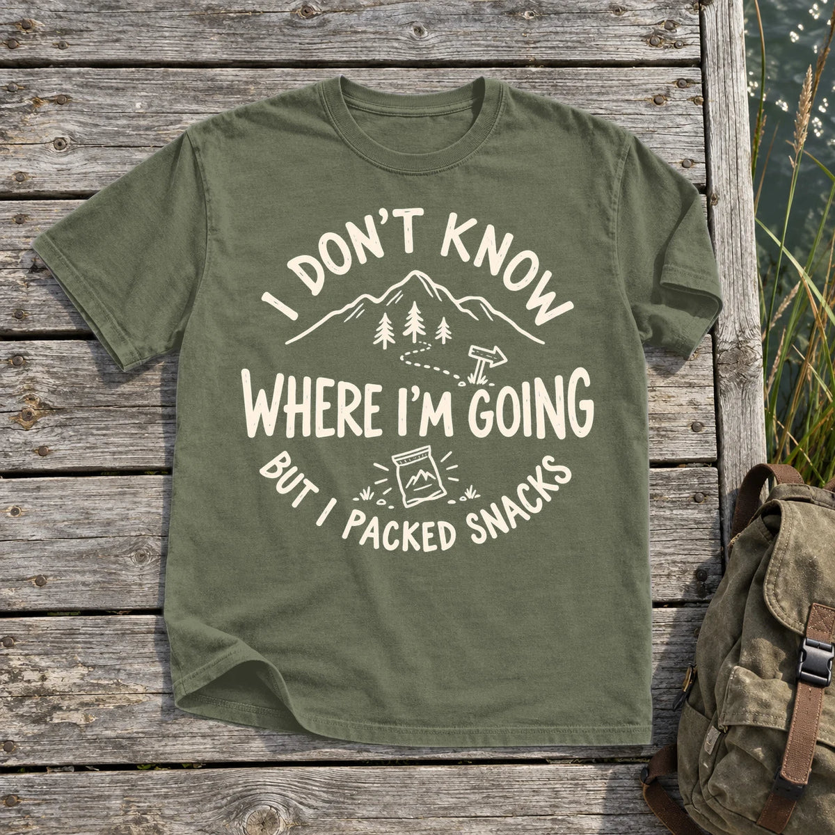 Lost But Packed Snacks Graphic Tee on Moss Premium Tee