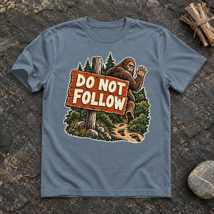 Do Not Follow Vintage Bigfoot Graphic Tee on Heather Indigo Everyday Soft Tee