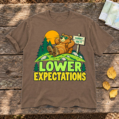 Lower Expectations Hiking Bear Graphic Tee on Espresso Premium Tee