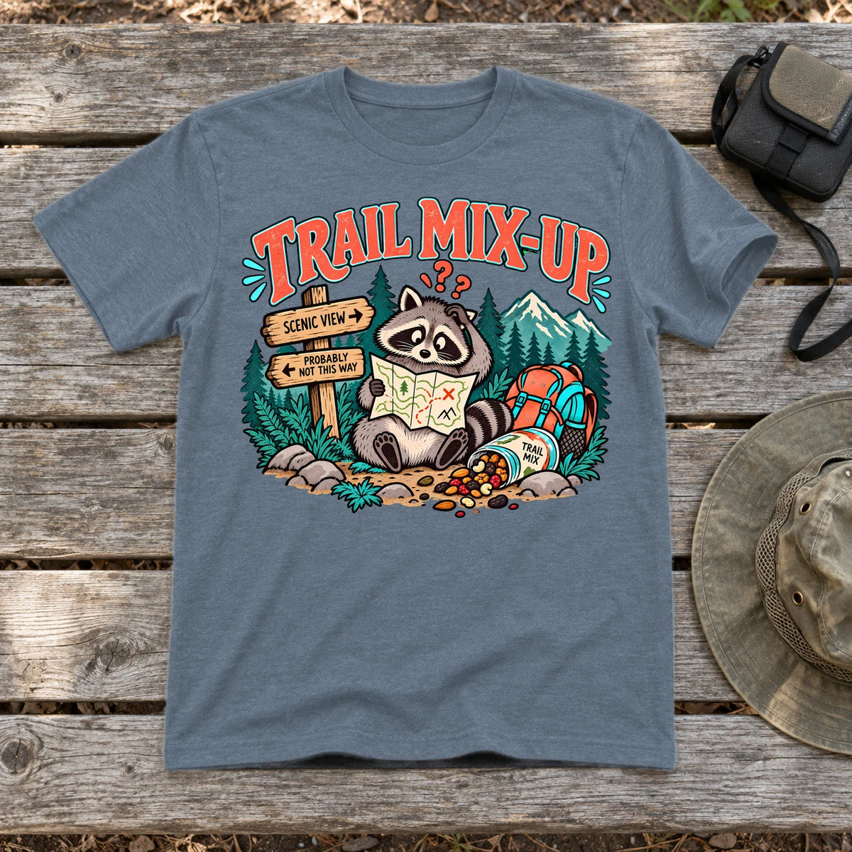 Trail Mix-Up Raccoon Graphic Tee on Heather Indigo Everyday Soft Tee