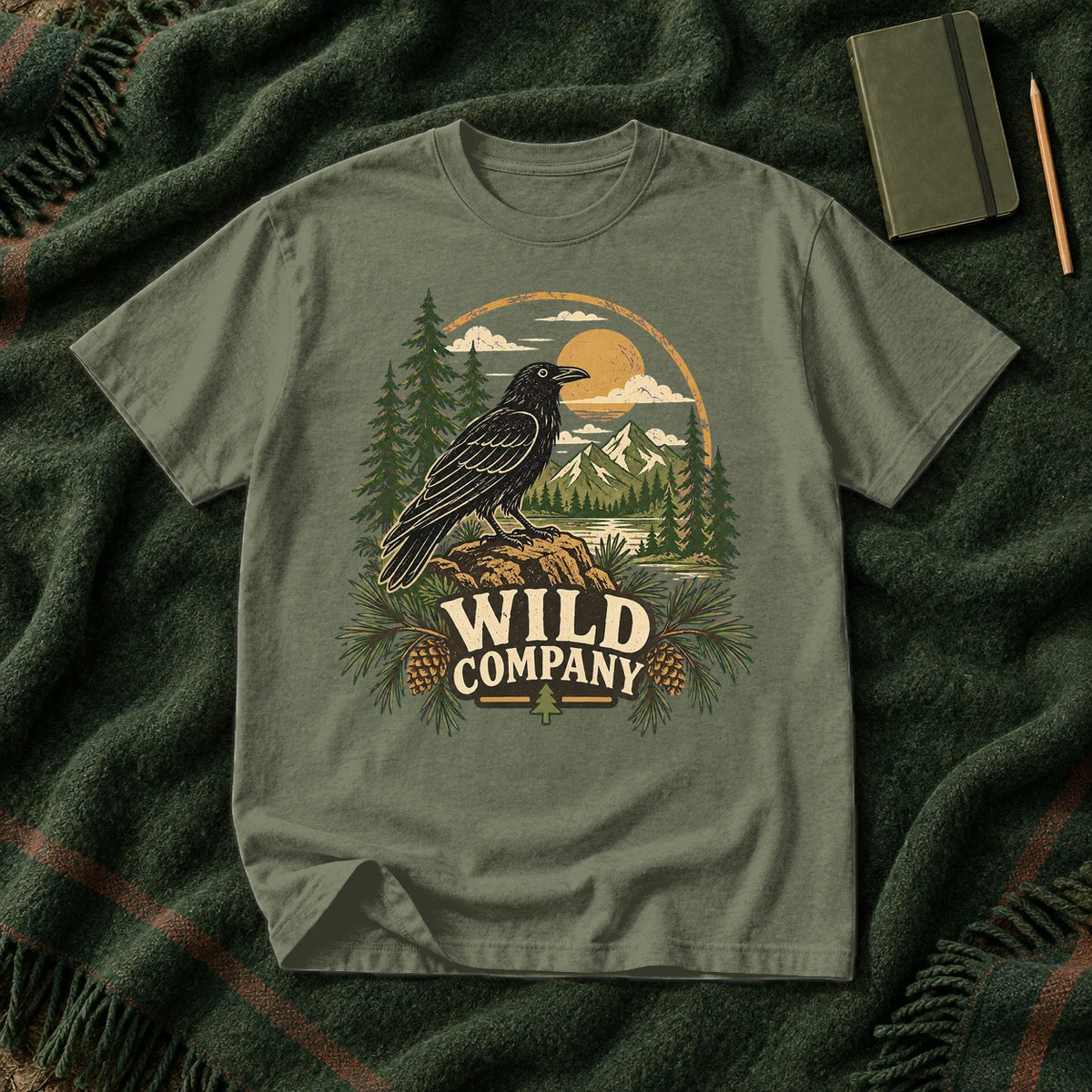 Wild Company Raven Graphic Tee on Moss Premium Tee