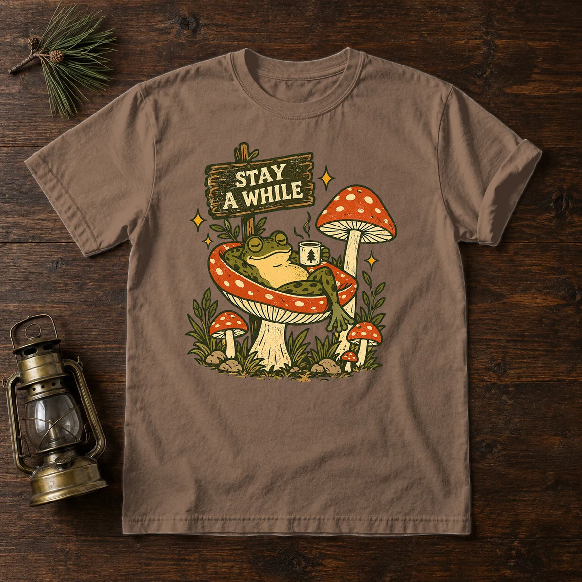 Stay A While Mushroom Frog Graphic Tee on Espresso Premium Tee