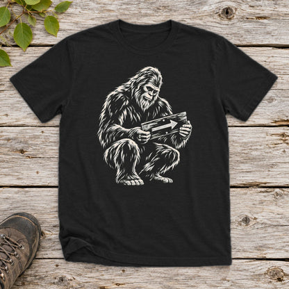 Sasquatch Trail Guide Graphic Tee on Black Everyday Soft Tee