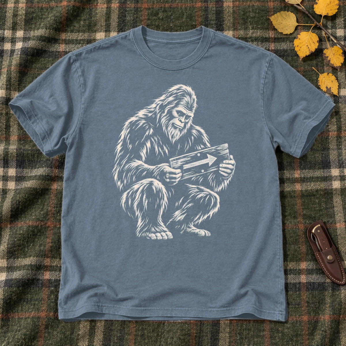 Sasquatch Trail Guide Graphic Tee on Heather Indigo Everyday Soft Tee