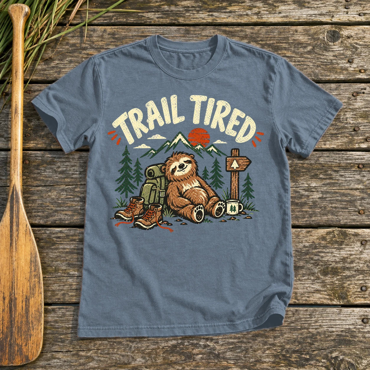 Trail Tired Sloth Hiking Graphic Tee on Heather Indigo Everyday Soft Tee