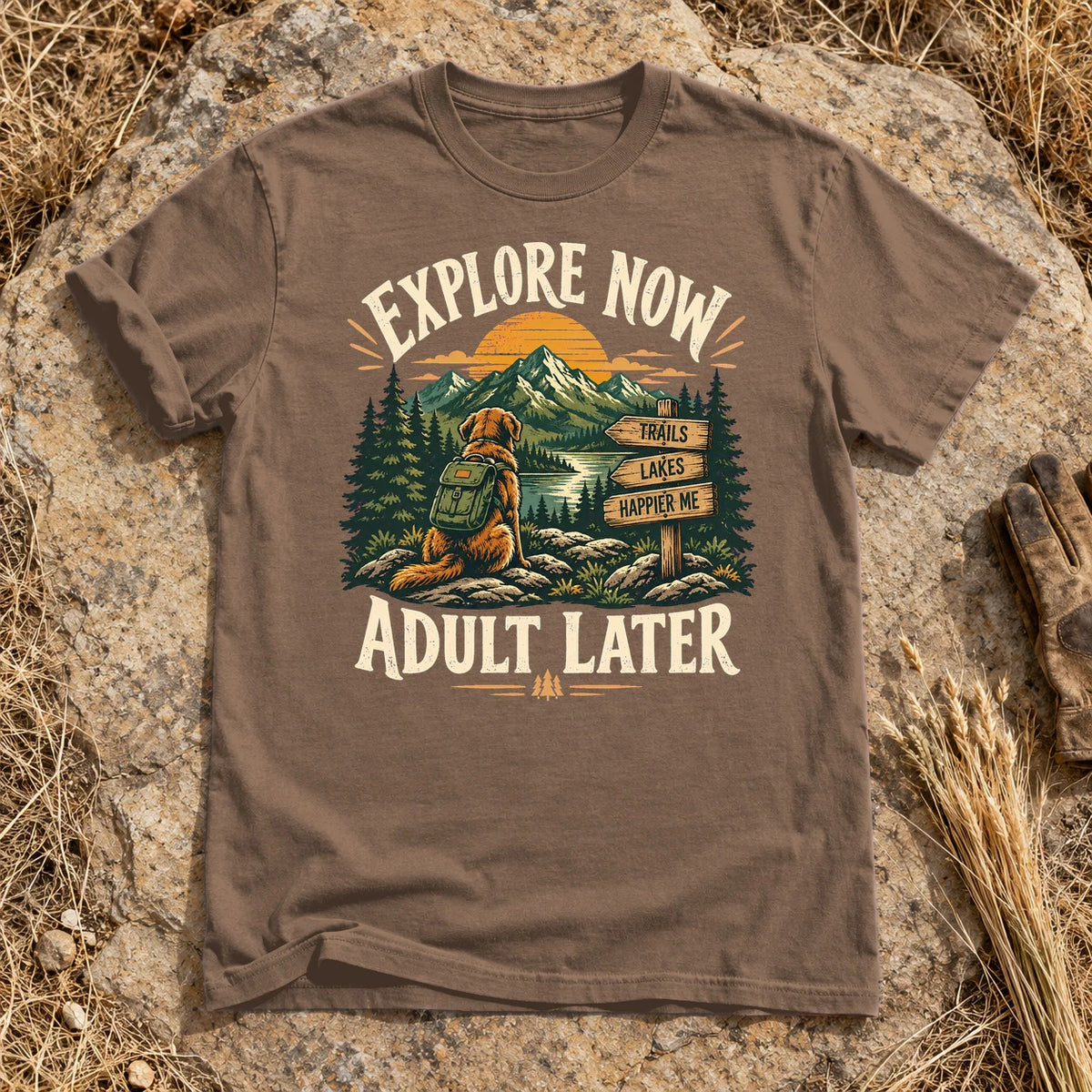 Explore Now Adult Later Dog Hiking Graphic Tee on Espresso Premium Tee