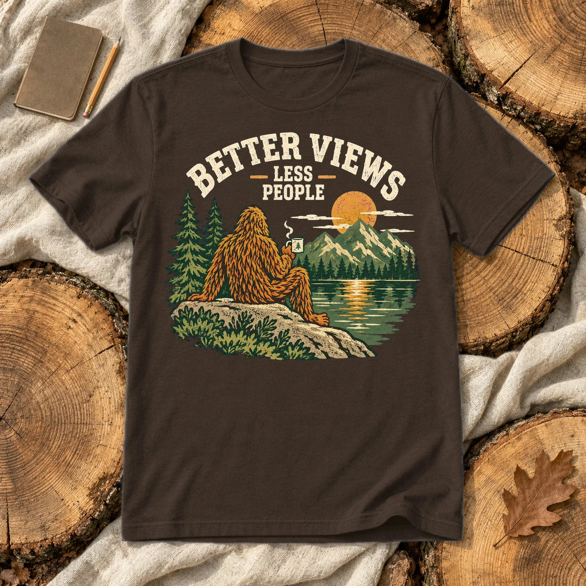 Better Views Less People Bigfoot Graphic Tee on Dark Chocolate Everyday Soft Tee